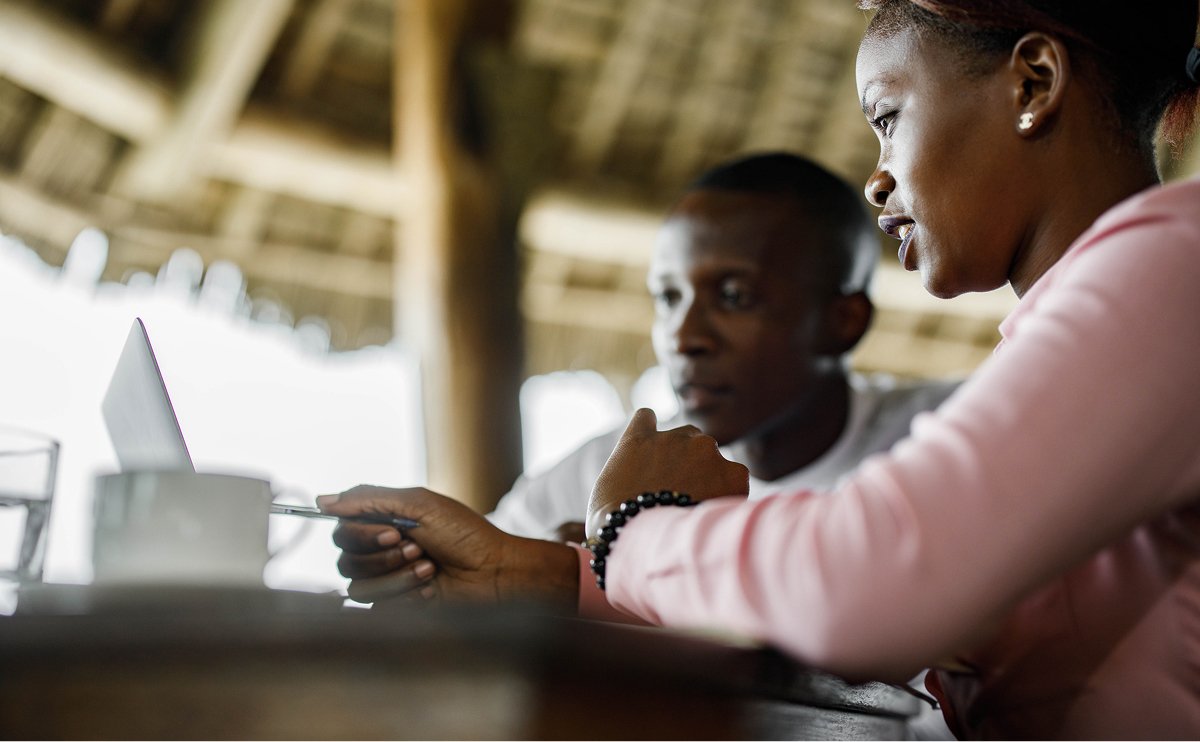 African teacher and pupil